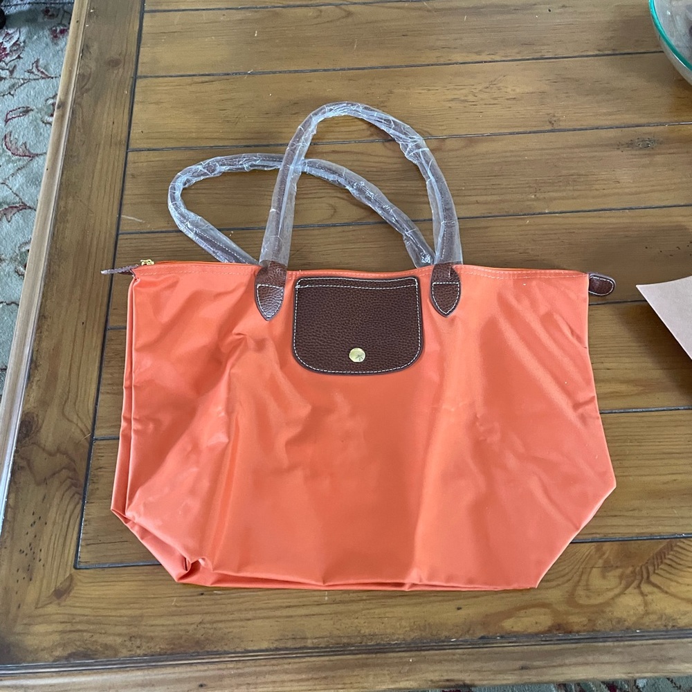 Long champ bag orange color